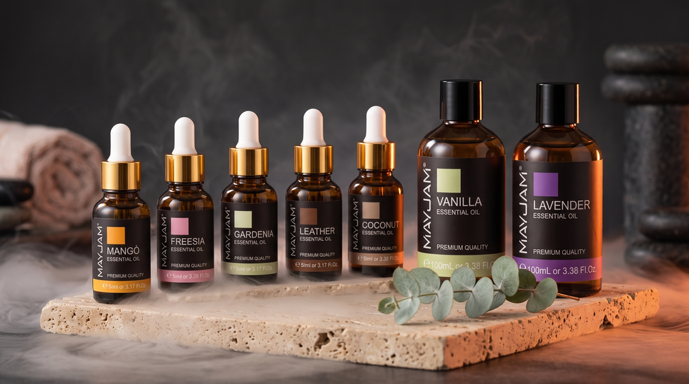MAYJAM scent oils lineup on travertine in mist